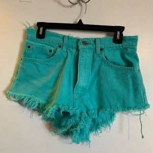 Levi’s distressed green shorts
